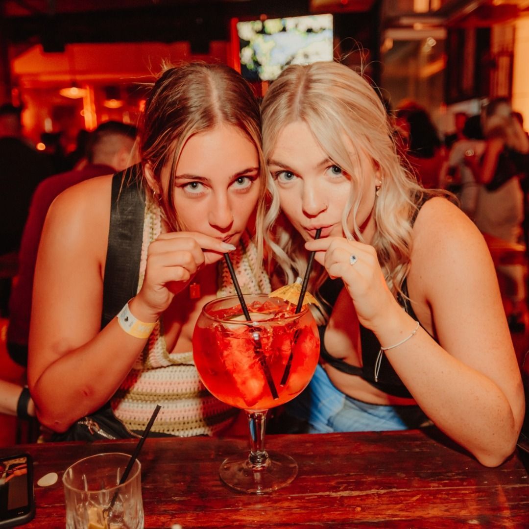 2 Woman Drinking Fishbowl Cocktail — Surfers Paradise, QLD — Steampunk Surfers Paradise