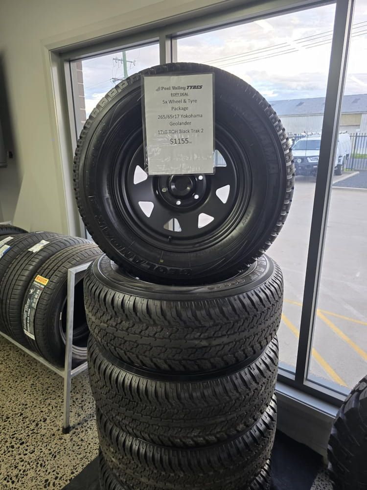 A Stack of Tires Sitting on Top of Each Other in a Store — Peel Valley Tyres in Gunnedah, NSW