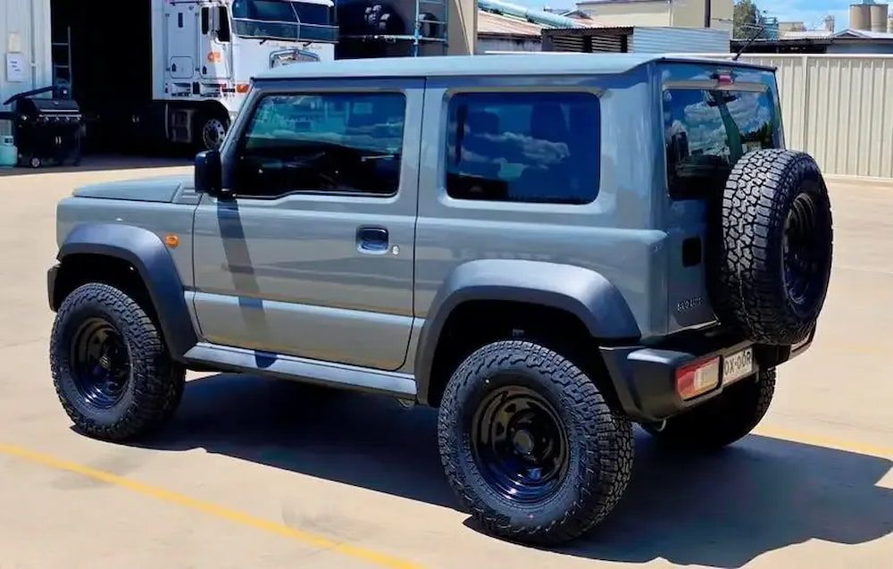 A Gray Suzuki Jimny is Parked in a Parking Lot — Peel Valley Tyres in Taminda, NSW