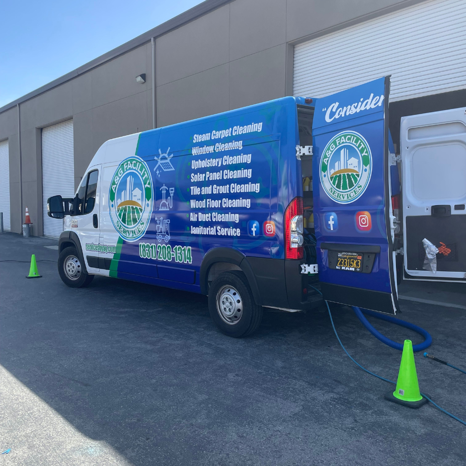 A blue van with the word consider on the side is parked in front of a building
