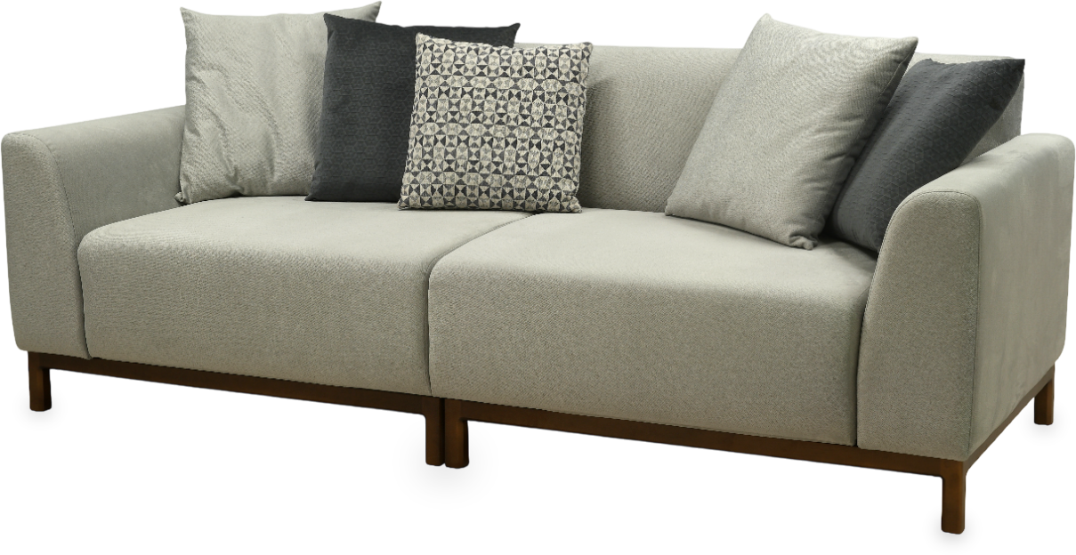 A couch with a lot of pillows on it A couch with a lot of pillows on it
