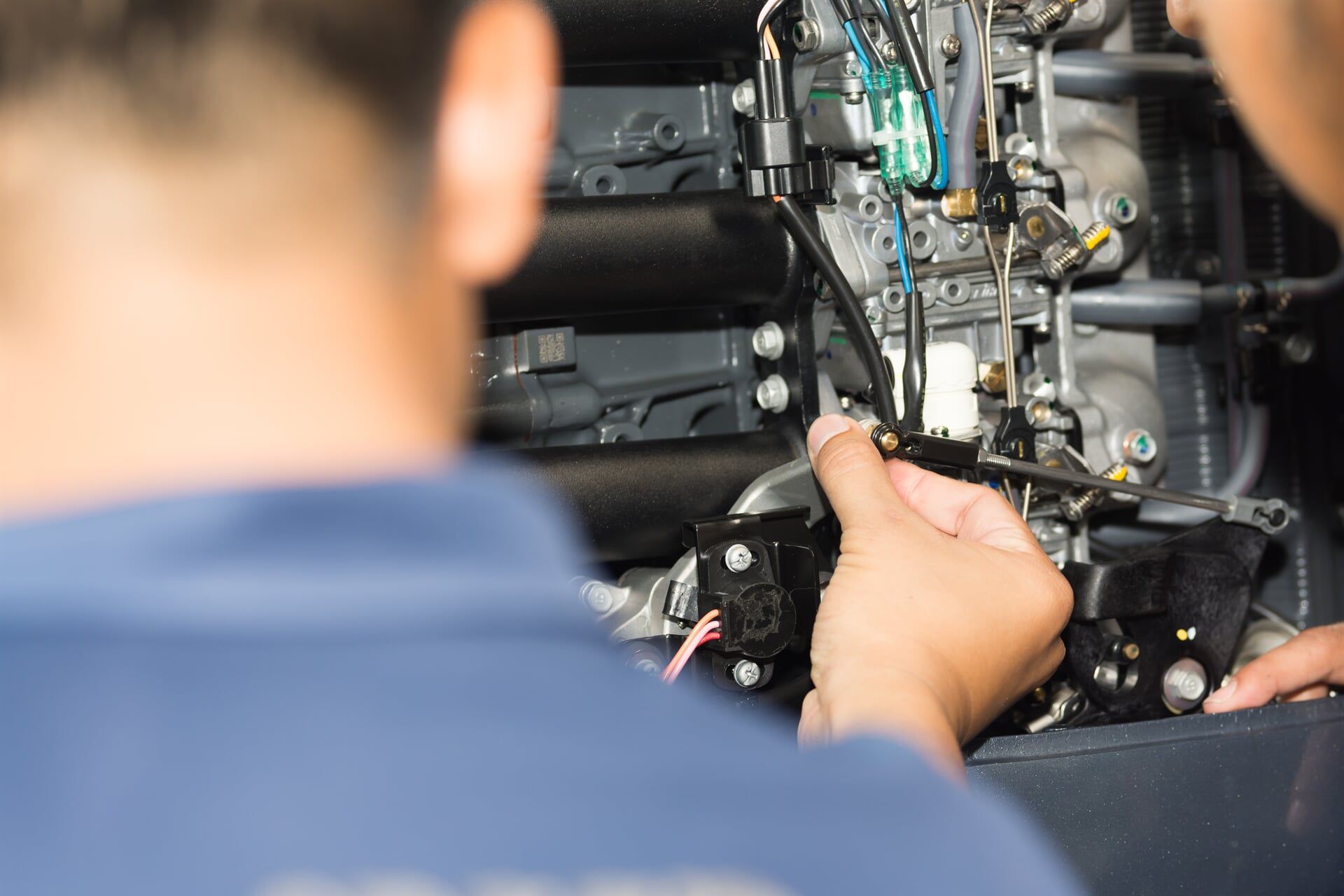 mechanic fixing an auto