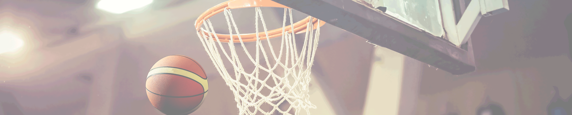Baseball on a dark surface, with visible stitching.
