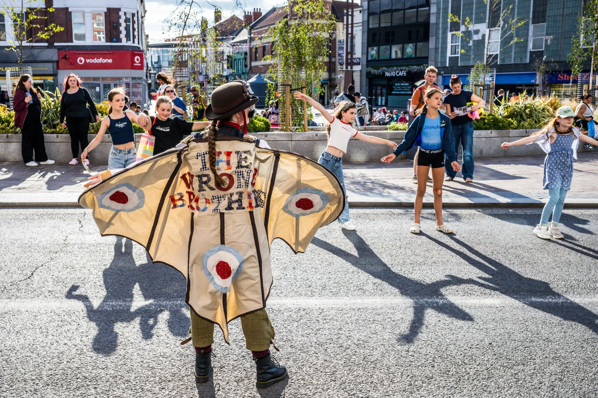The Wrong Brothers interactive walkabout act entertaining the public at an Arts Festival
