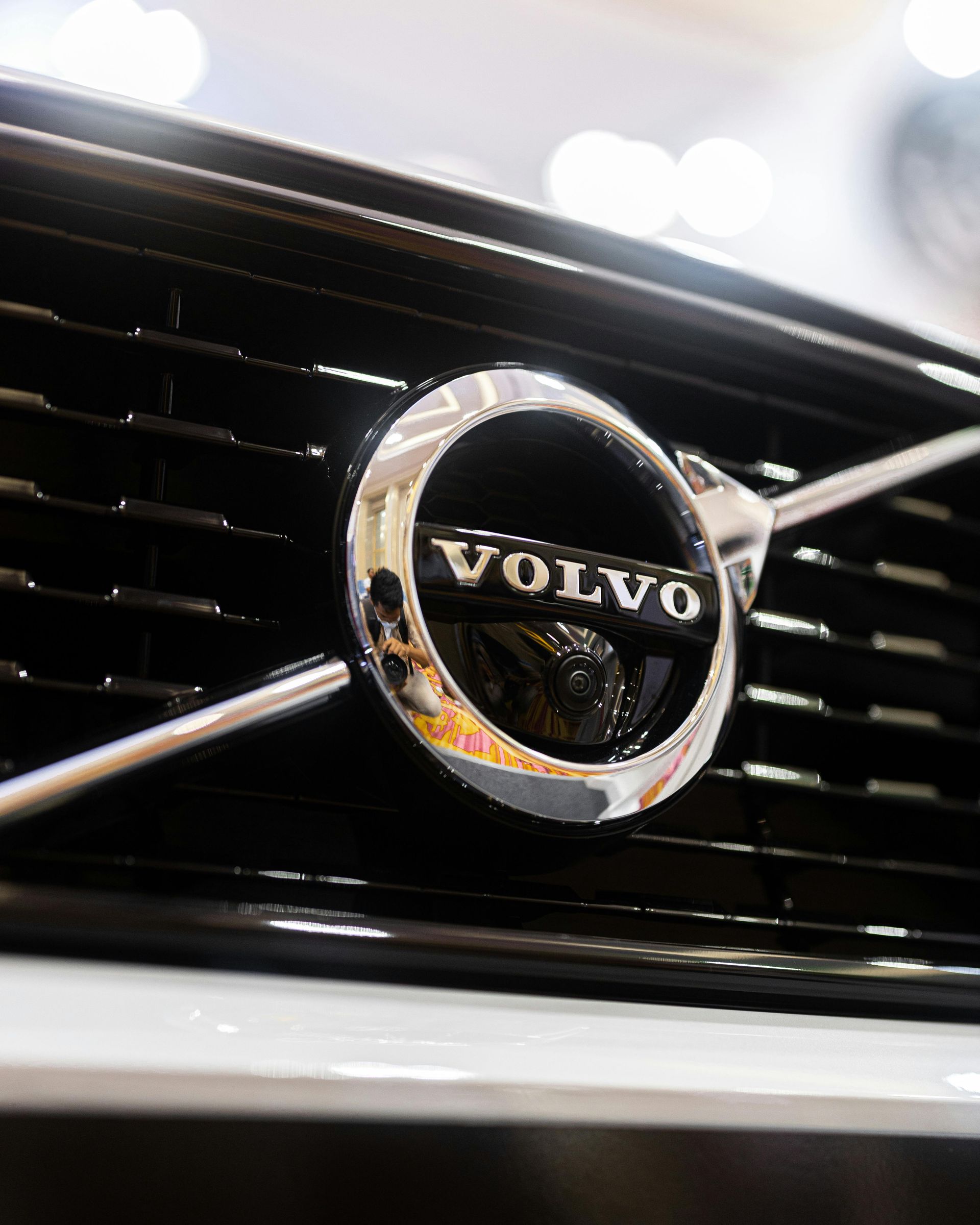 A close up of the front grille of a volvo car.