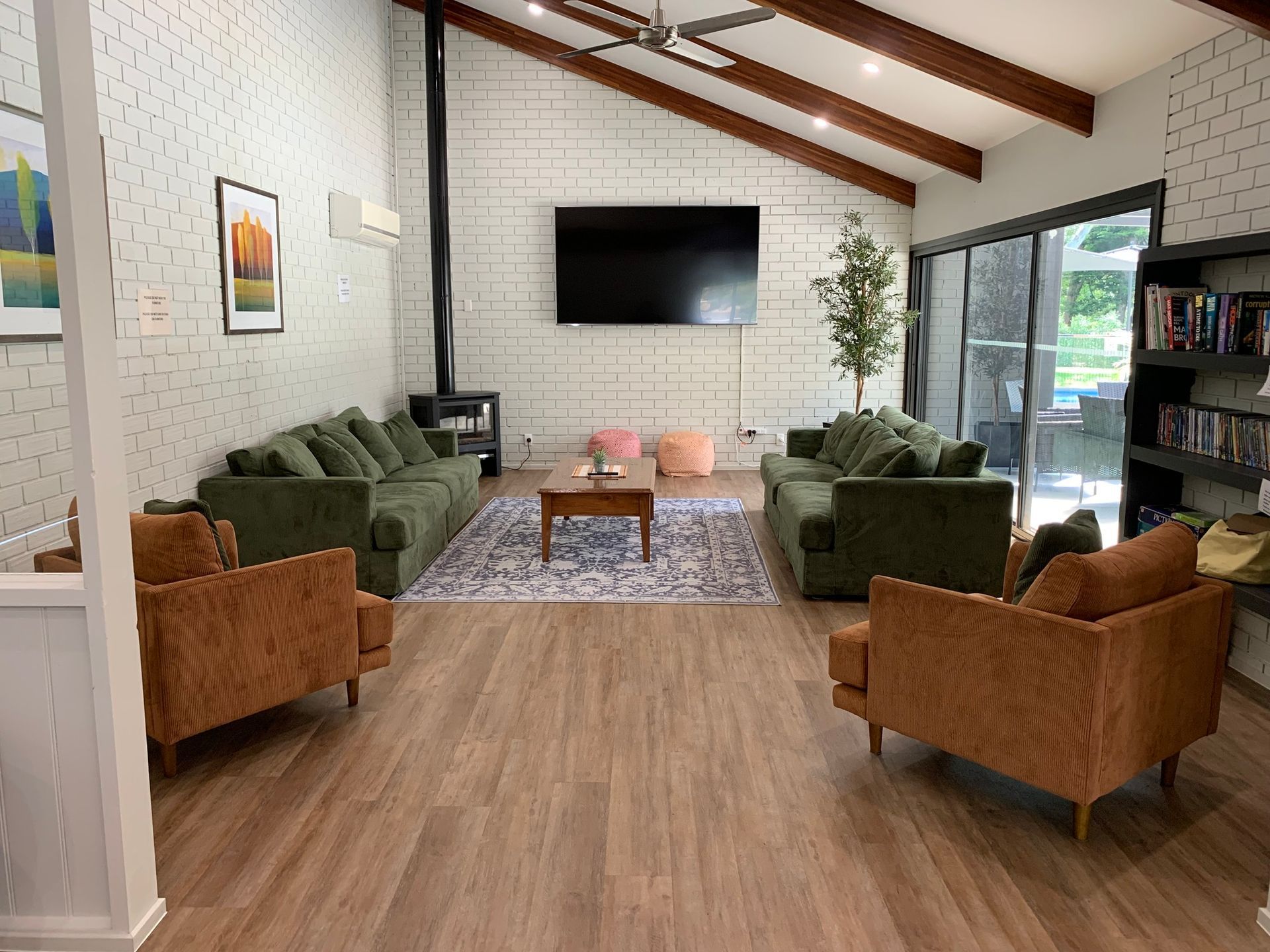 A living room filled with furniture and a flat screen tv.