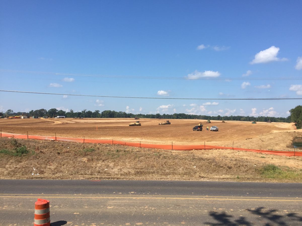 A construction site is being built on the side of the road.