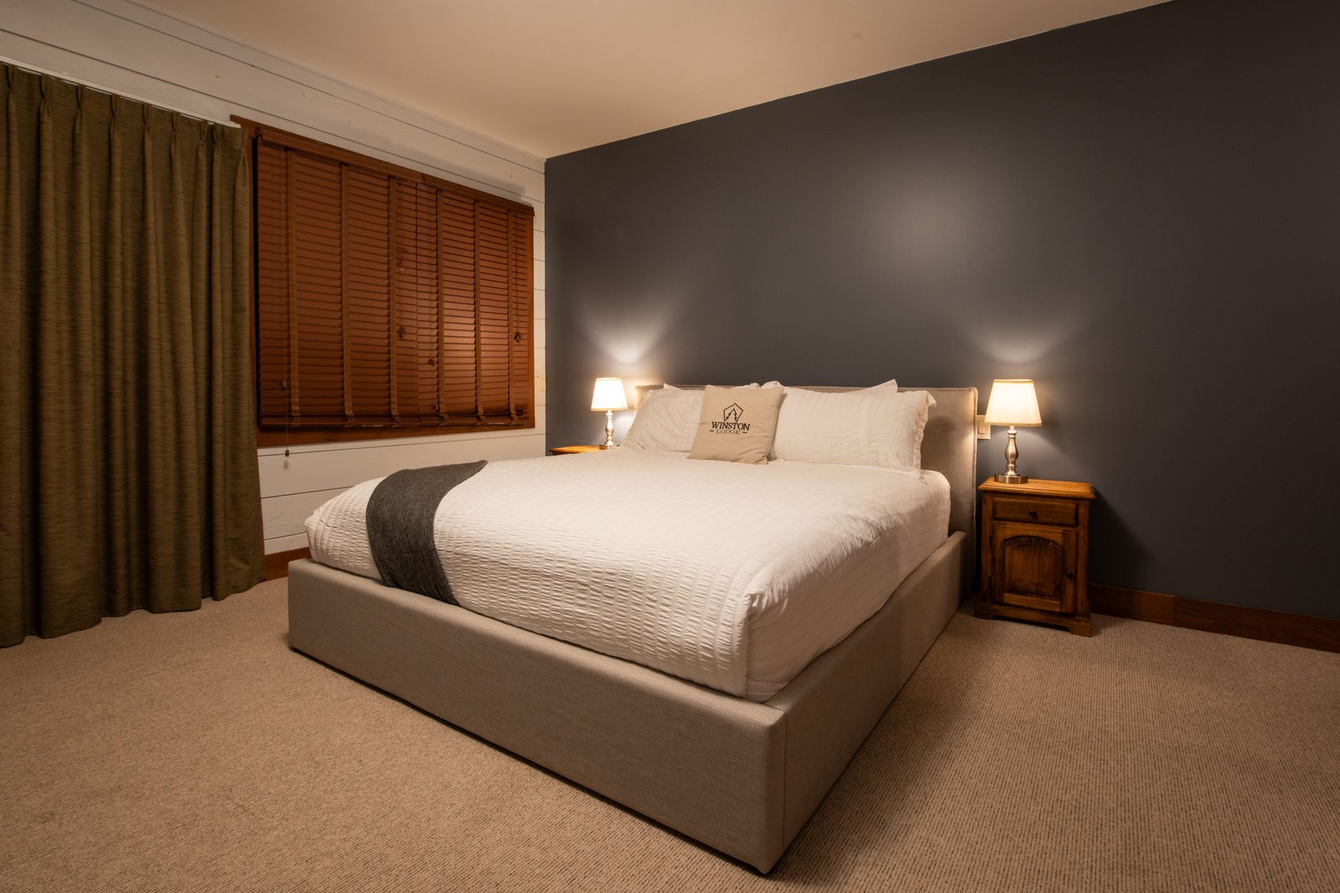 There is a large bed in the middle of the room.