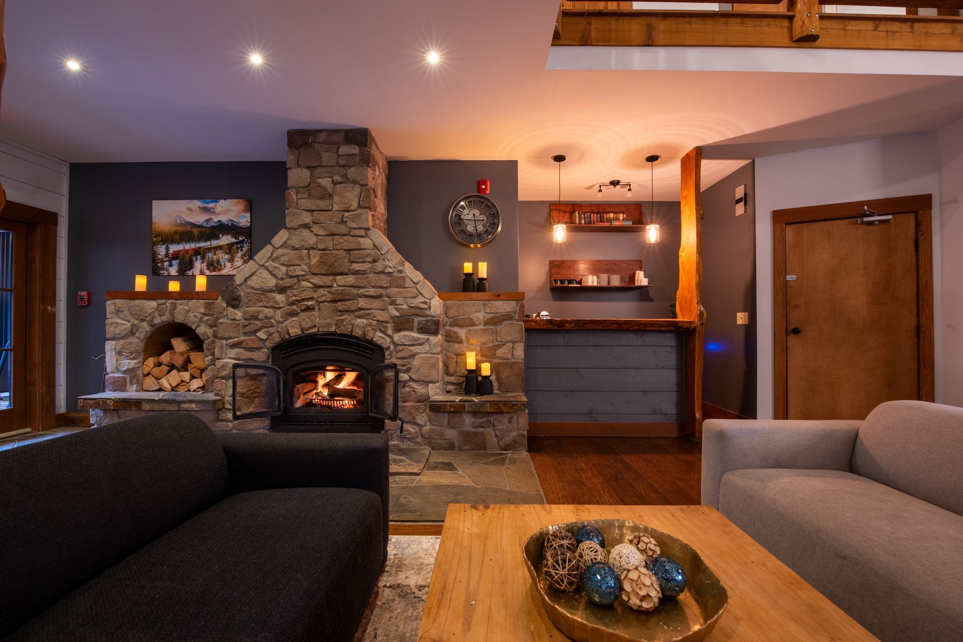 A living room with a fireplace and a couch