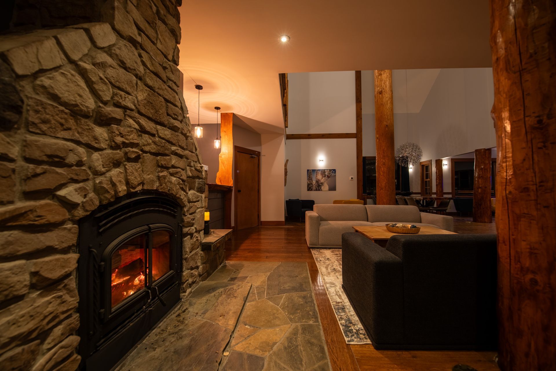A living room with a fireplace and a couch.