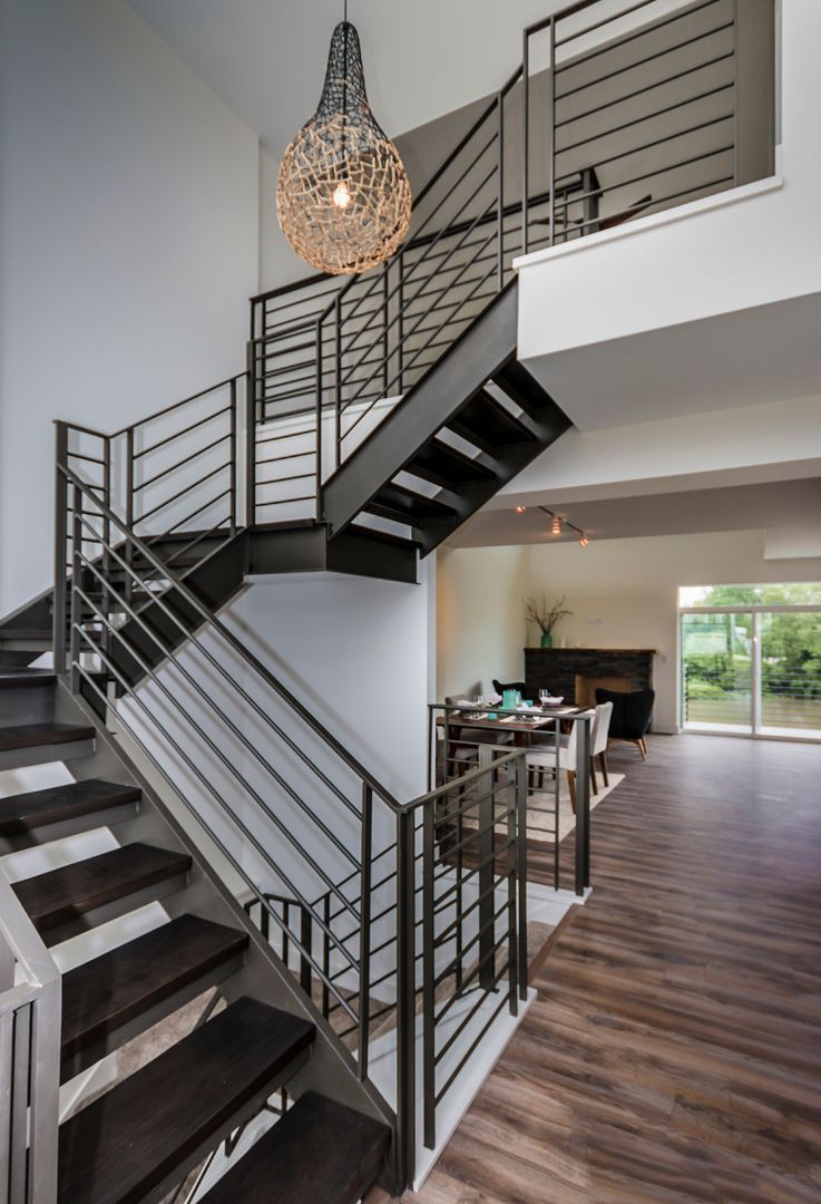 Stairway and light fixture in custom build. Naperville, Hinsdale, Glen Ellyn, Highland Park, Winnetka, Oak Brook. 