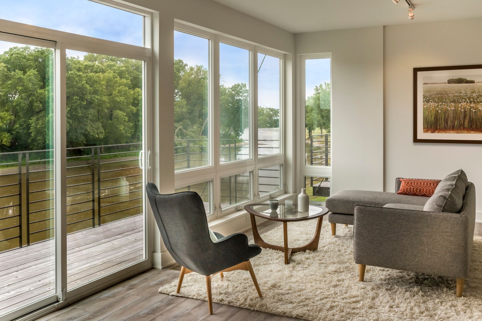 Open concept living room and kitchen in custom home design. Townhomes Plainfield, Naperville, Hinsdale, Wheaton, Illinois. 
