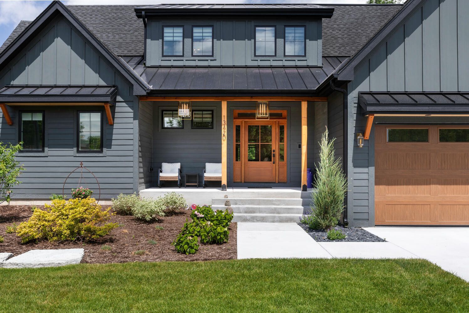Custom home in Plainfield, Illinois exterior front porch, garage.  Chicago western suburbs in Hinsdale, Elmhurst, Naperville.