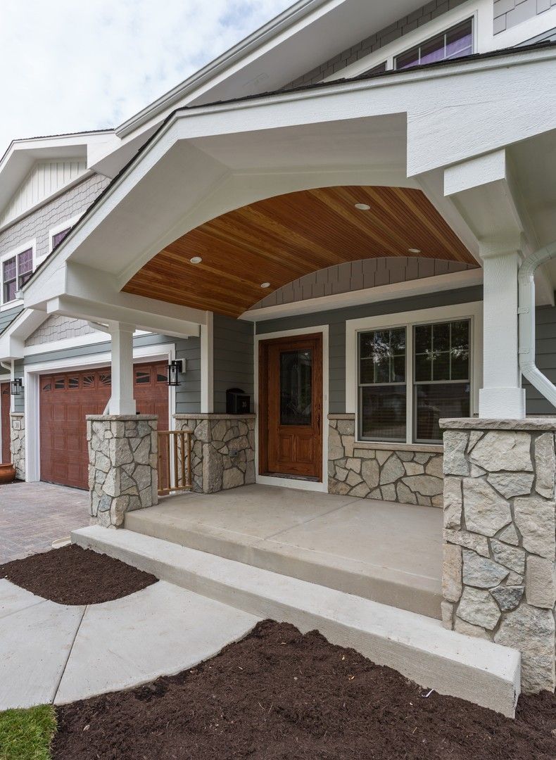 Custom home in Westmont, Illinois front porch portico. Hinsdale, Elmhurst, Naperville, Downers Grove, Highland Park, Winnetka