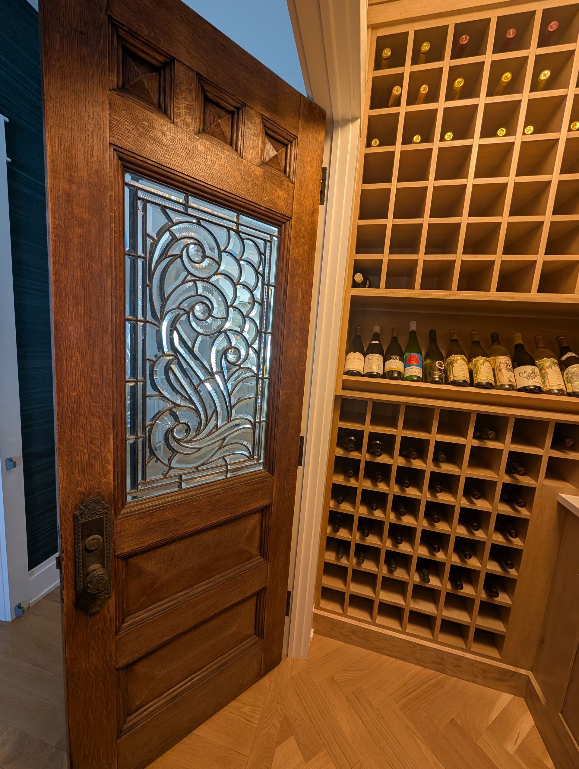 Custom wine cellar with built-in lighting in Elmhurst, Illinois.  Chicago western suburbs Hinsdale, Naperville, Downers Grove