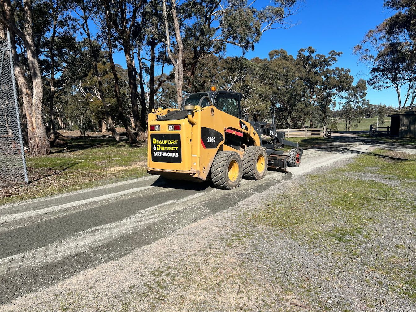 A Yellow Excavator is making a driveway — Beaufort & District Earthworks in Beaufort, VIC