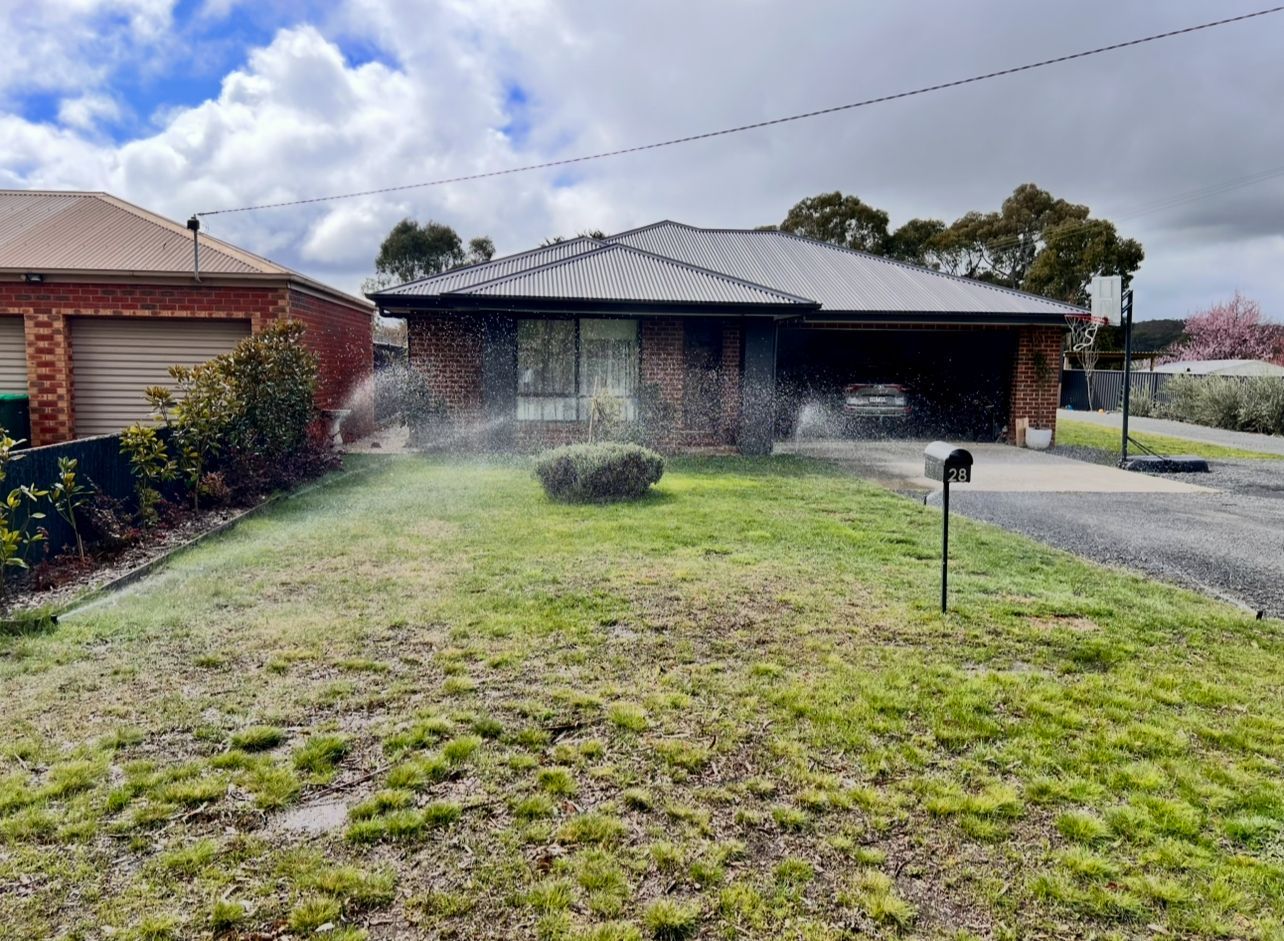 Watered With Sprinklers on a Sunny Day — Beaufort & District Earthworks in Beaufort, VIC