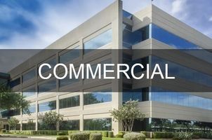 Commercial building with large windows and 