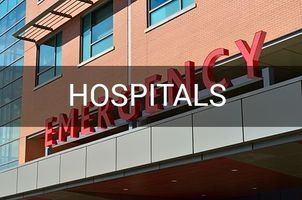 Hospital entrance with a red 