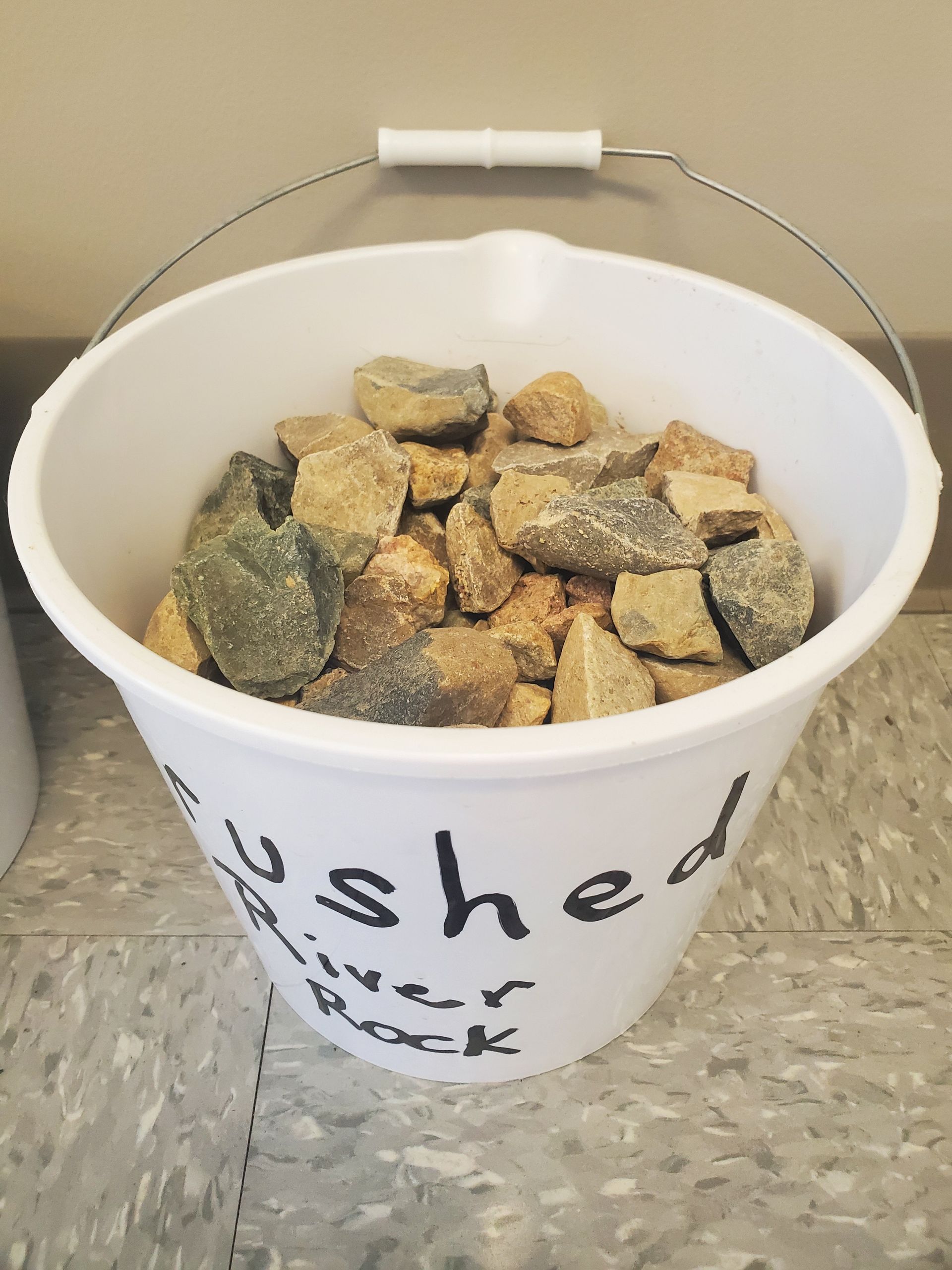 Bucket filled with Rocks – Defiance, OH – Rath Builders Supply, Inc.