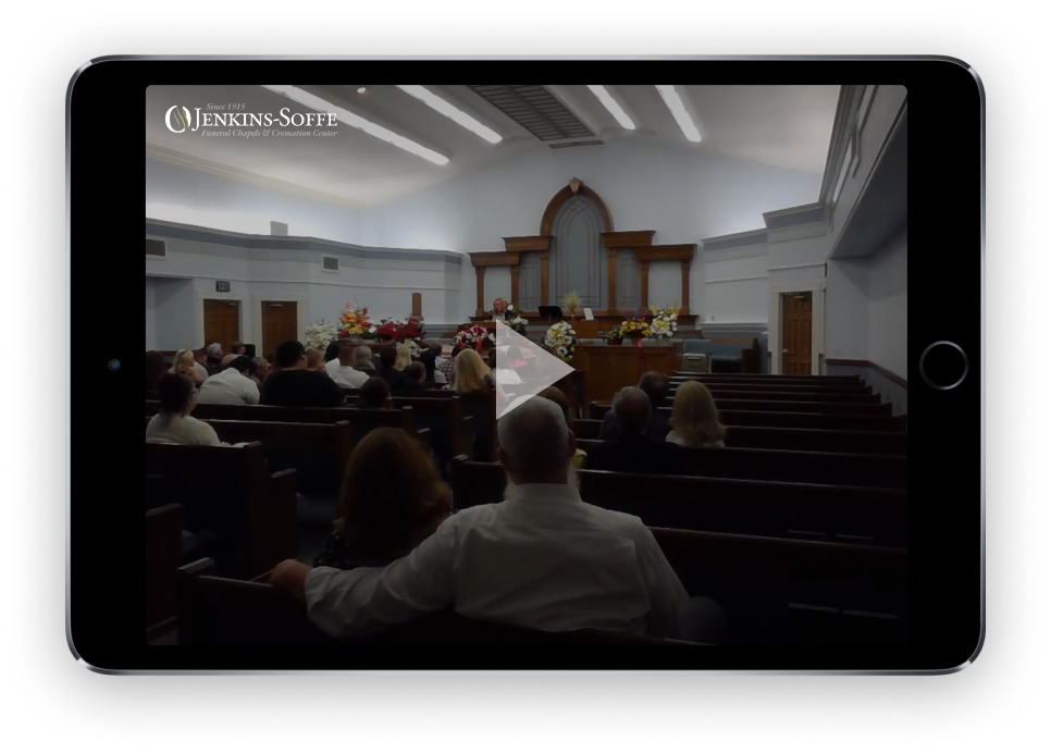Audience seated in a church sanctuary facing the pulpit during a service