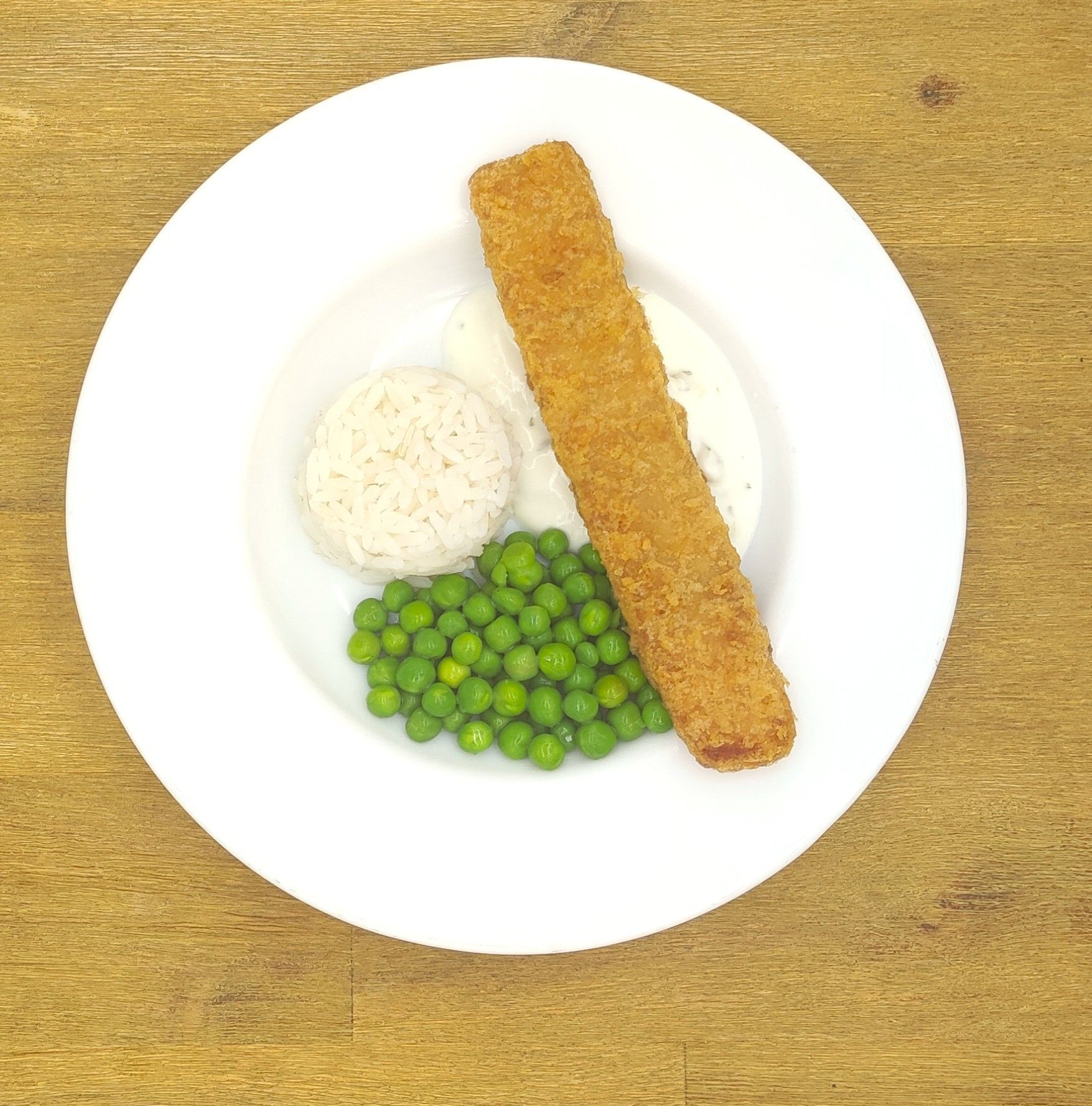 Kochraupe mit einem Teller, auf dem „Bild folgt“ steht