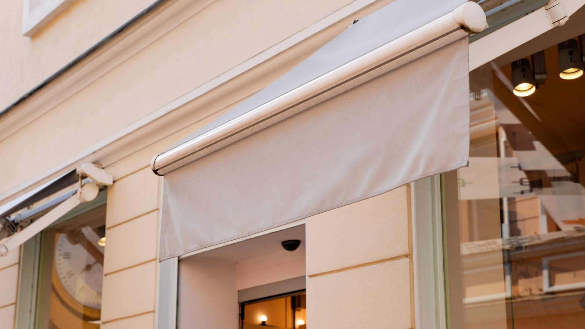 Retractable Awnings for Businesses | Awnings, Blinds, and Shutters by ...