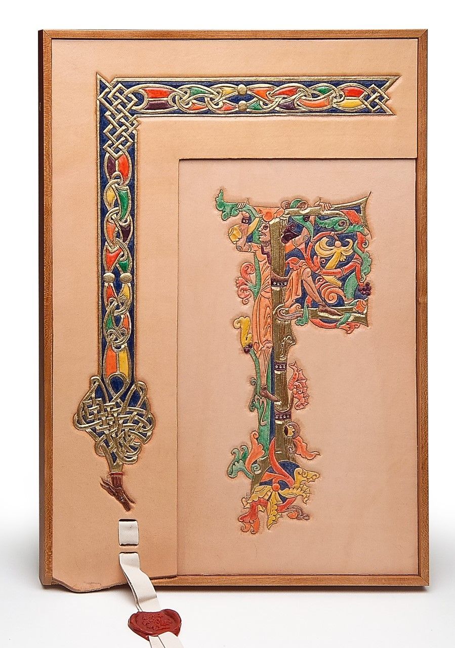Intricately tooled and painted leather in the style of medieval illuminations.