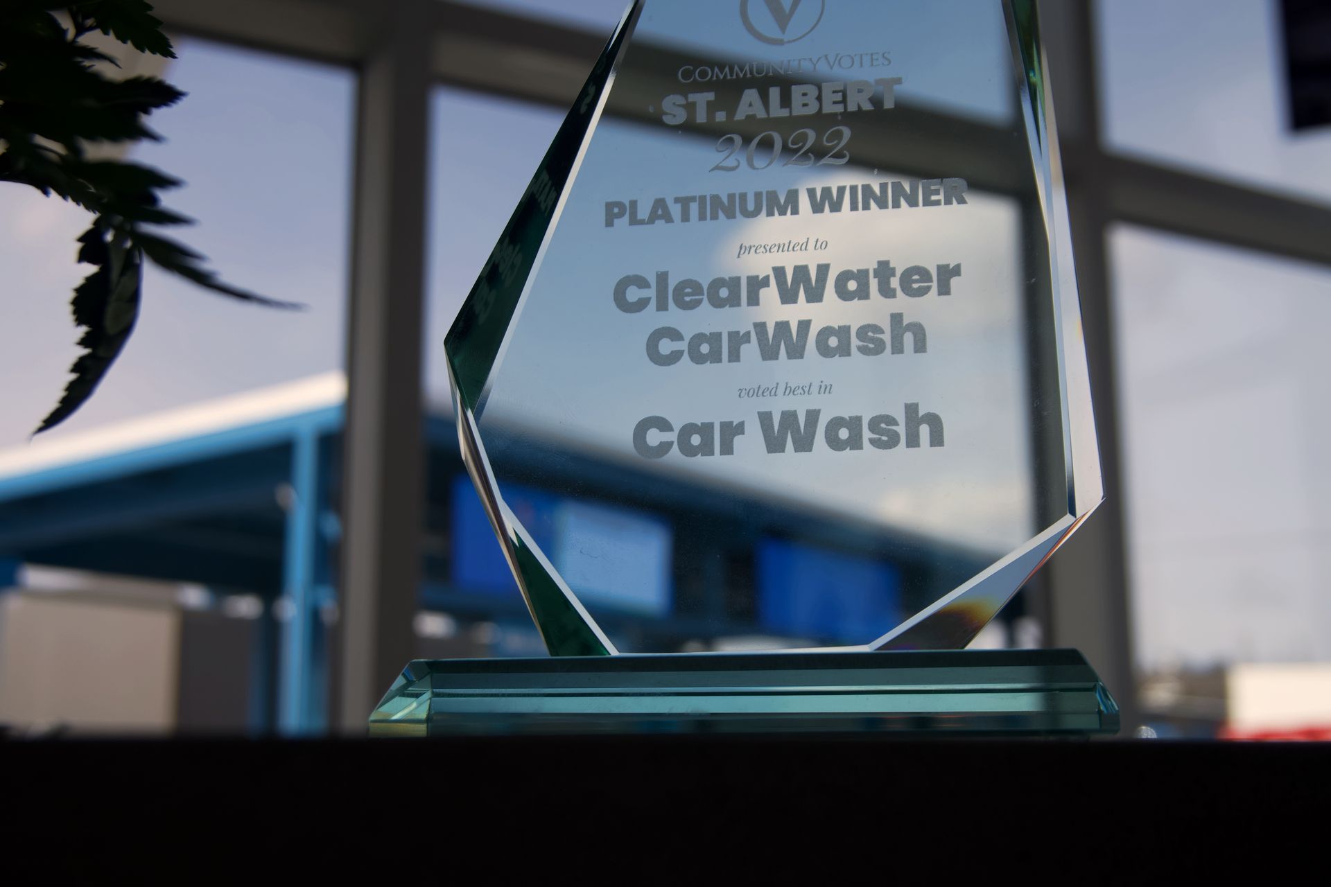 glass trophy with ClearWater CarWash voted the best in 2022