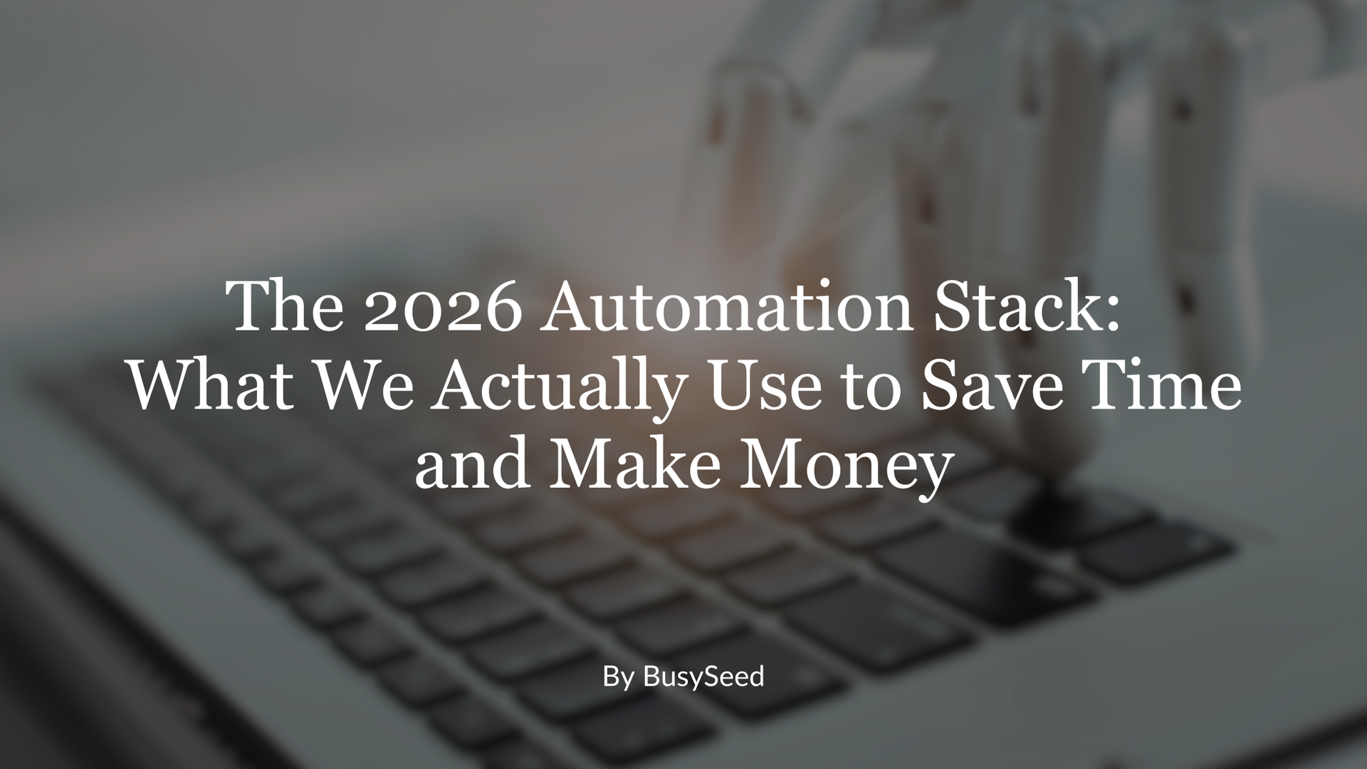 A robotic hand on a laptop keyboard. Text overlay: 