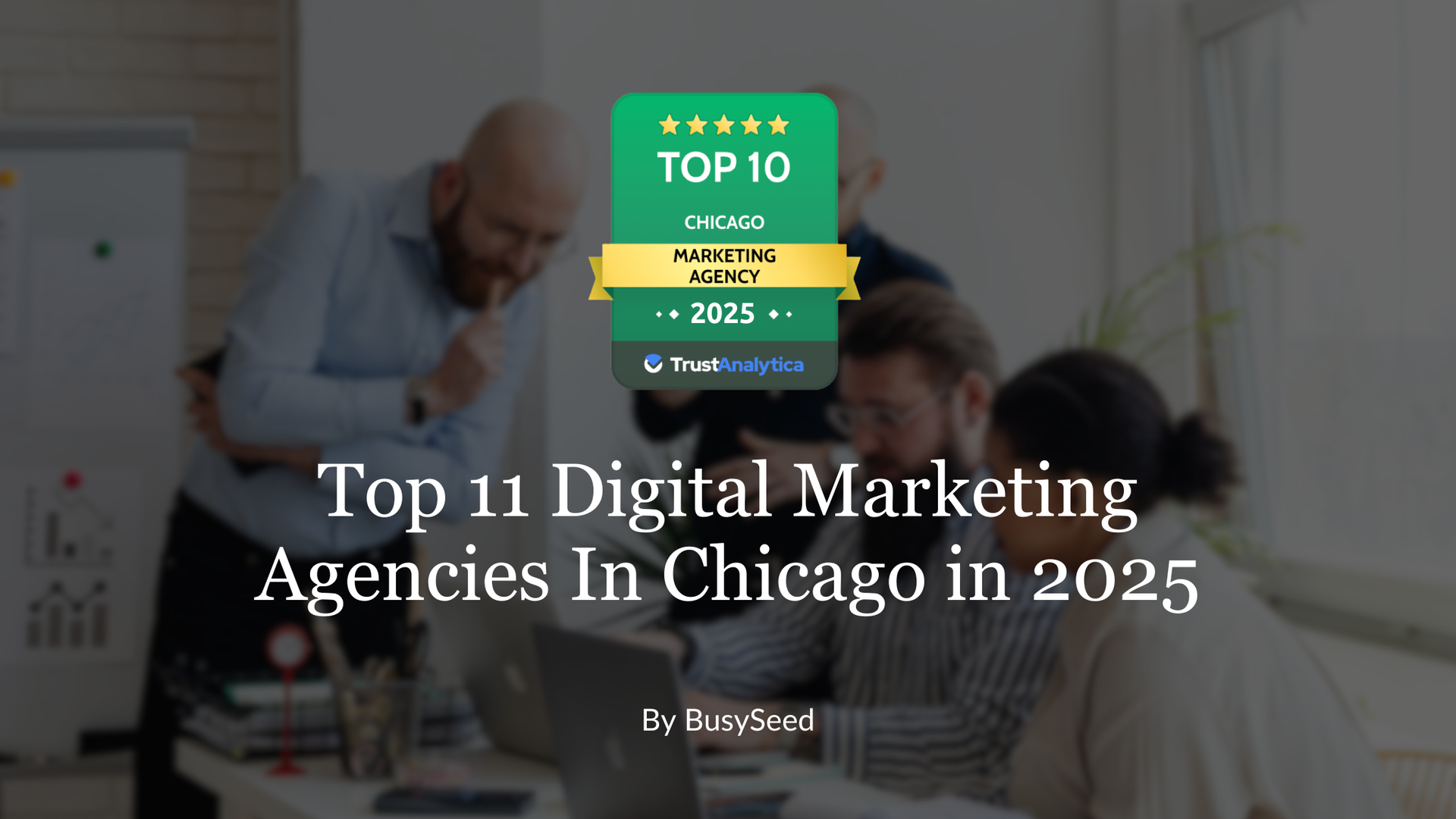 A group of people are having a meeting in a conference room.