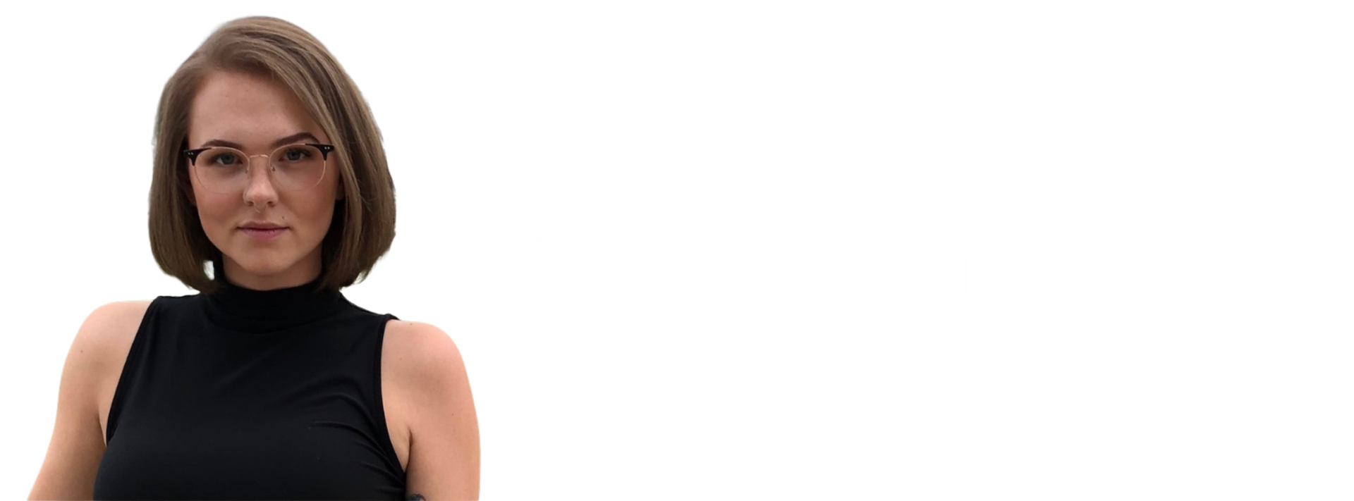 A man in a suit and tie is smiling for the camera.