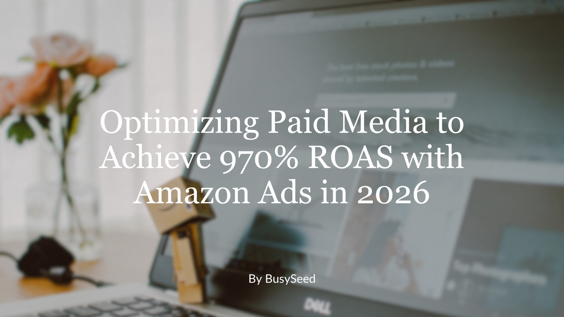 Presentation slide titled “Optimizing Paid Media to Achieve 970% ROAS with Amazon Ads in 2026” over a laptop background