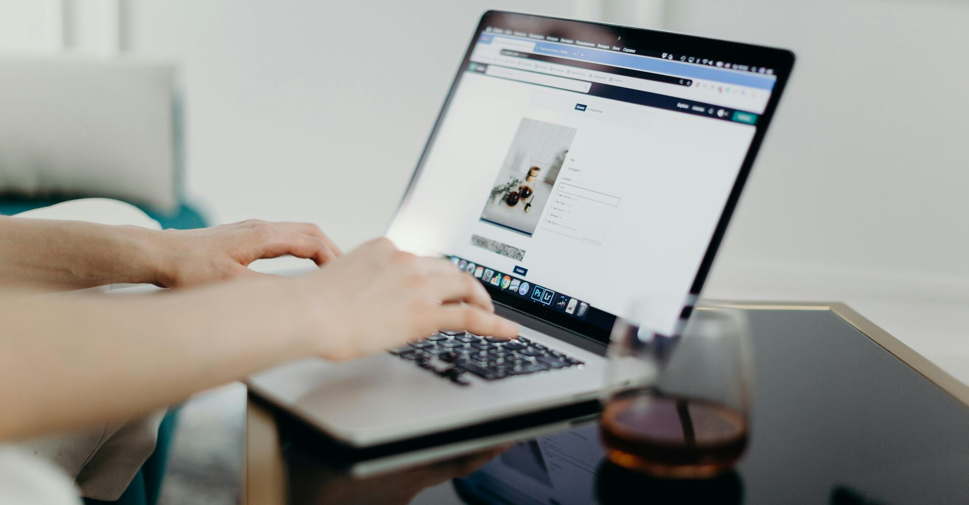 A laptop is open to a page that says subscribe