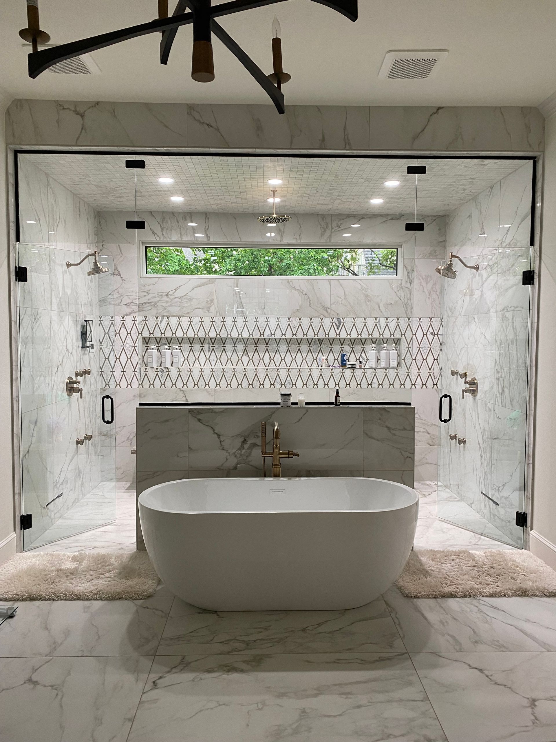 There is a bathtub in the middle of the bathroom.