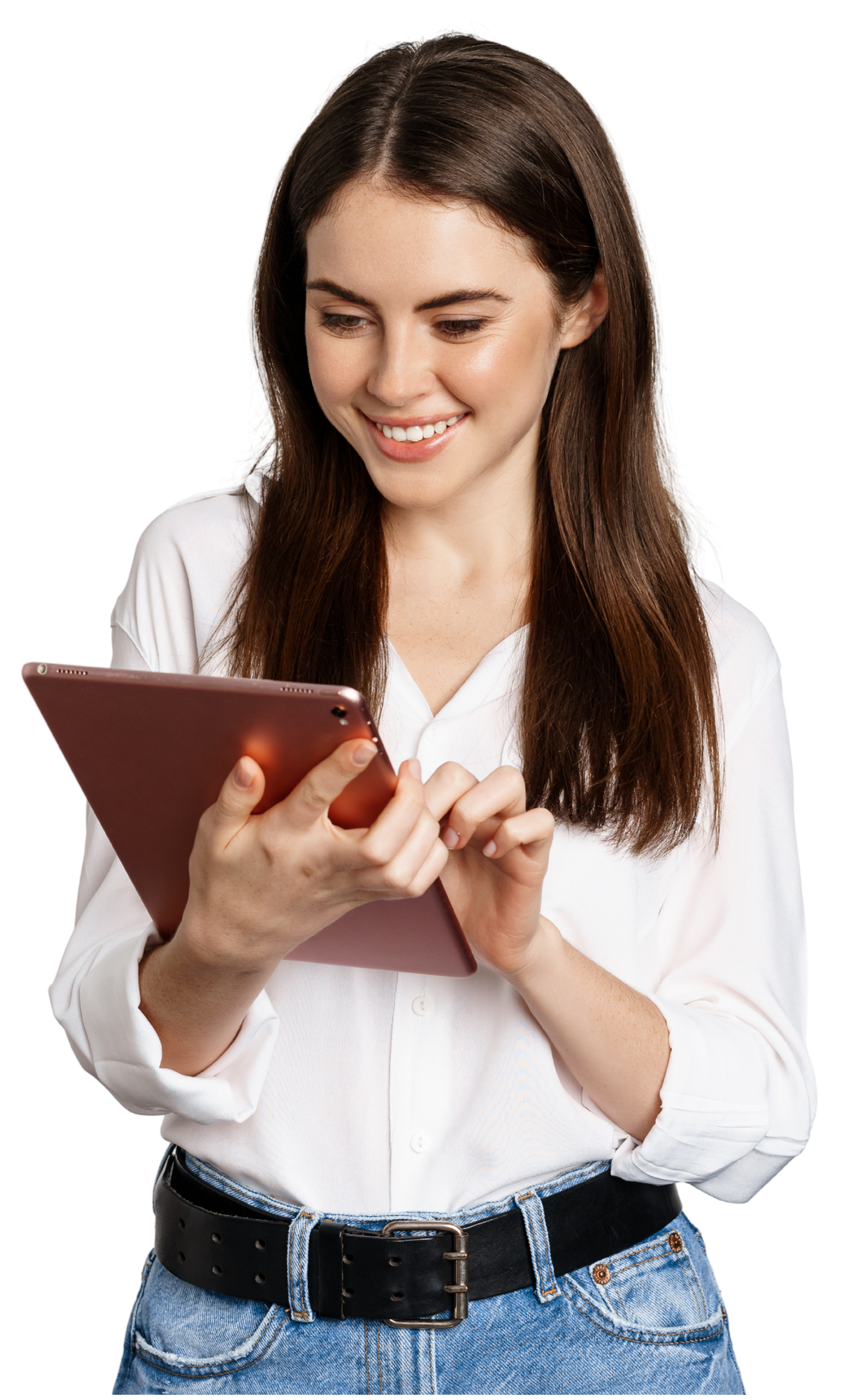 Woman smiles, using a tablet; wearing a white shirt, jeans, and a black belt.