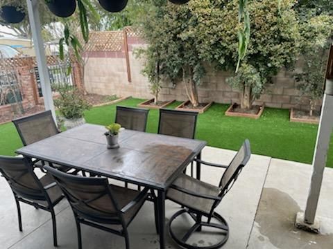 Patio table and pet turf
