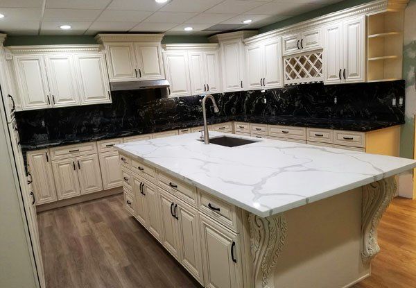 white kitchen remodel with new sink granite countertop and new kitchen cabinets