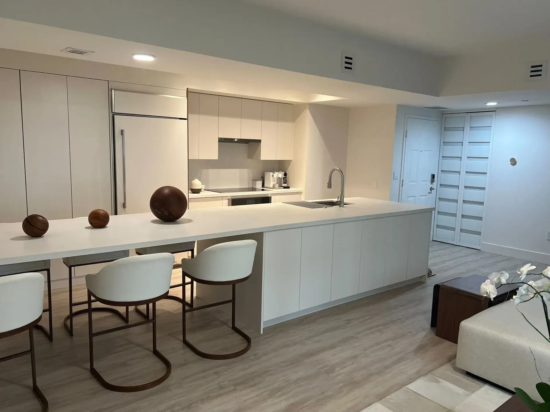 Large custom kitchen, In white matte finish, and large island | Coral Gables