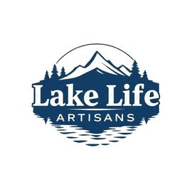 The logo for lake life artisans shows a lake surrounded by mountains and trees.