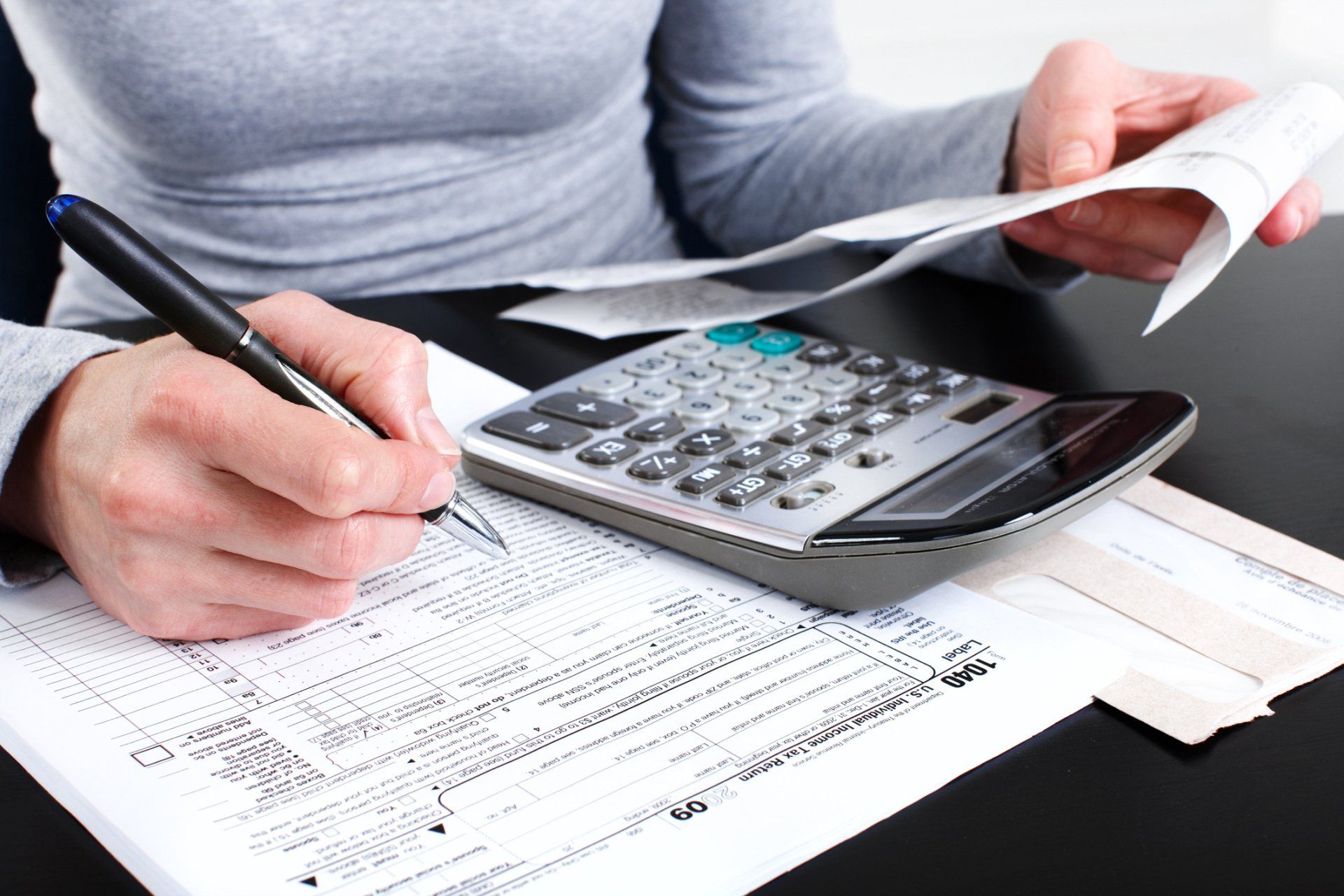 Man Calculating His Finances – Houston, TX — Ro Watson