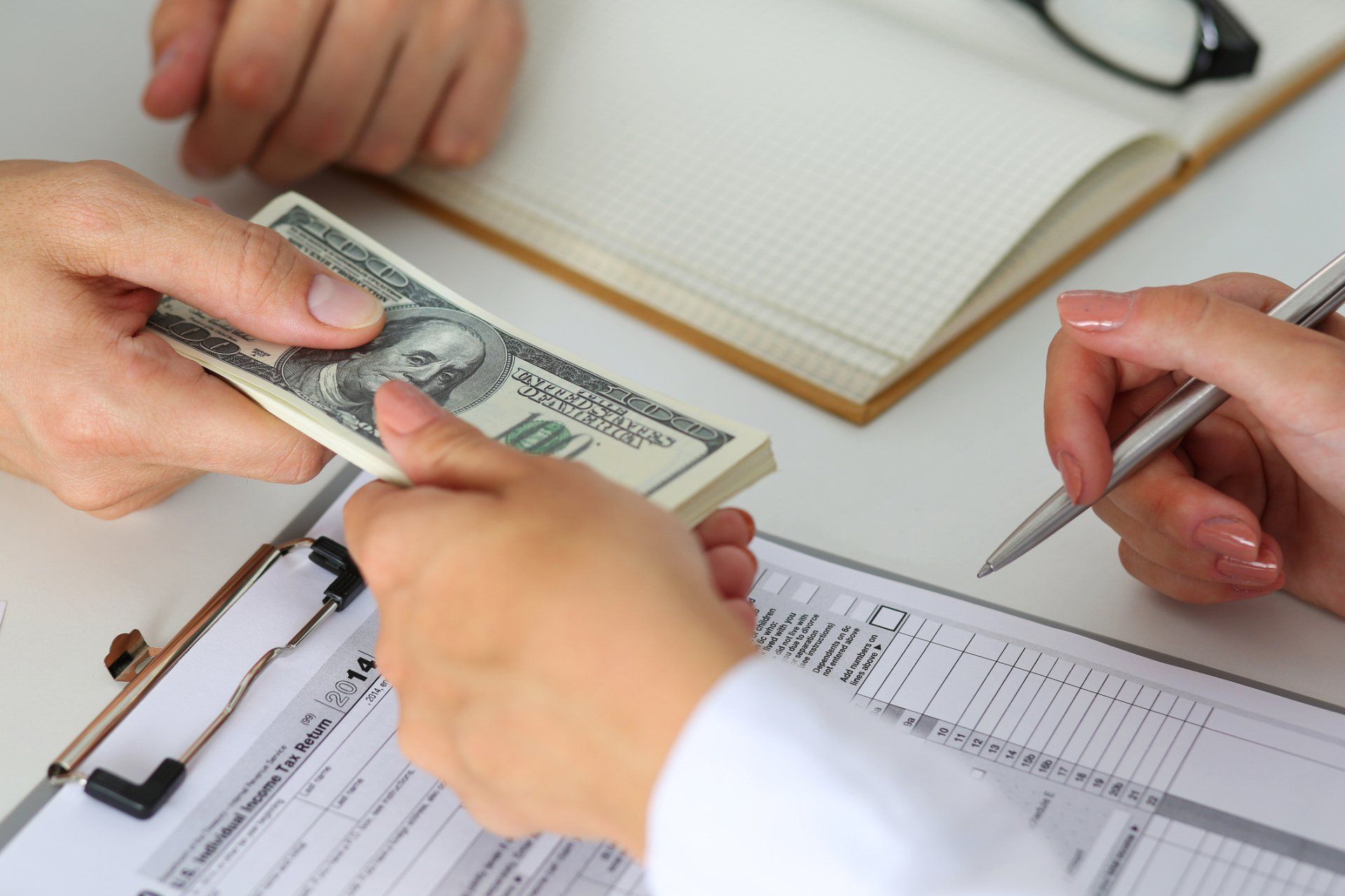 Man Handing Money – Houston, TX — Ro Watson