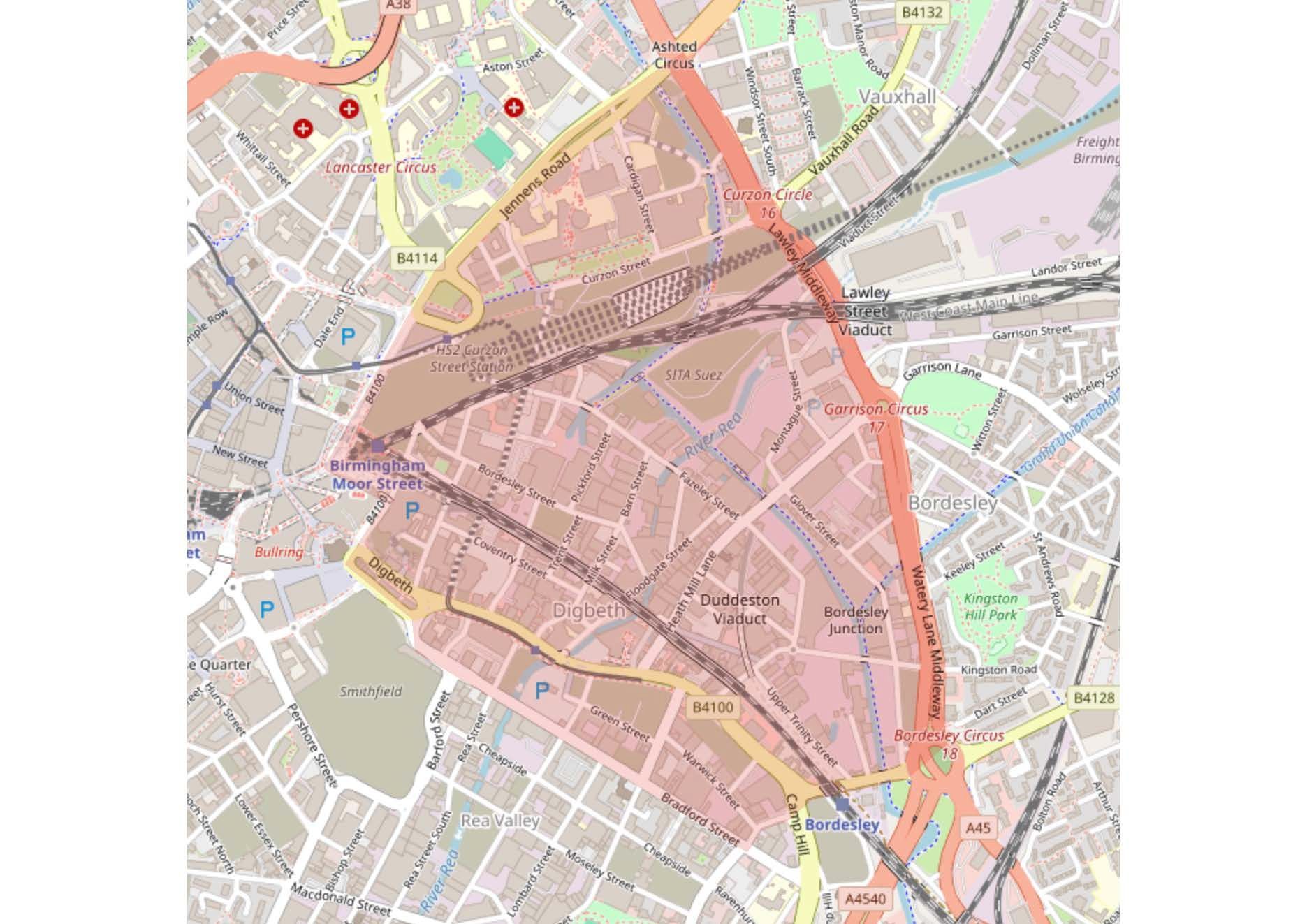 Map outline of a region, tinted pink, with roads and buildings visible within the borders.