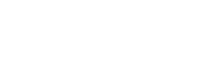 A black and white photo of a wooden walkway leading to the ocean