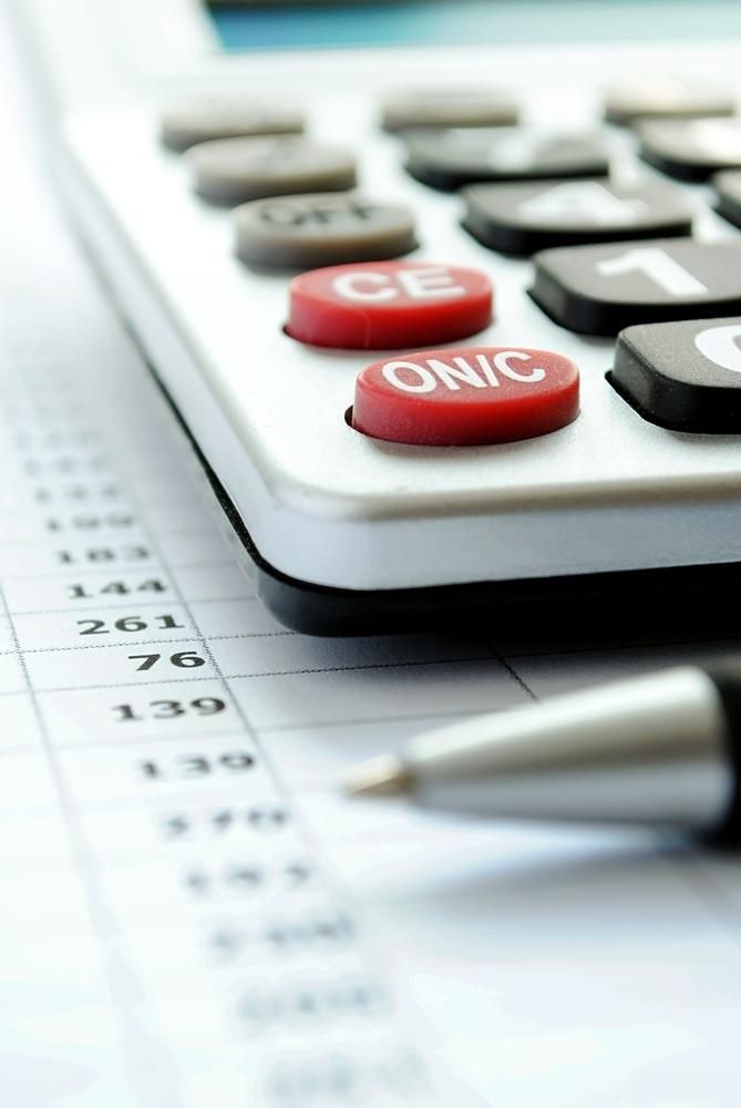 A Calculator With A Red Button That Says On/c — NR Bookkeeping In Alstonville, NSW