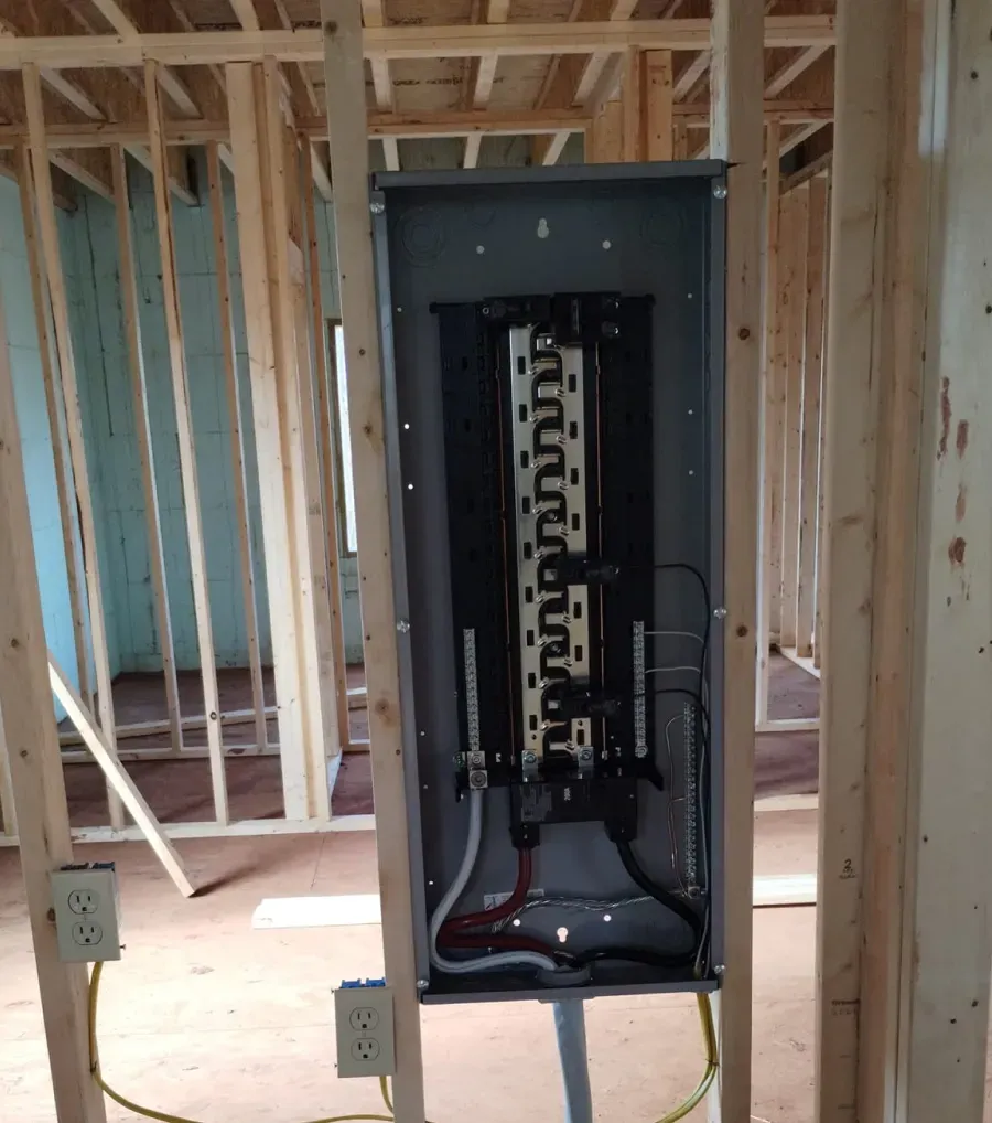 An electrical box in a house under construction