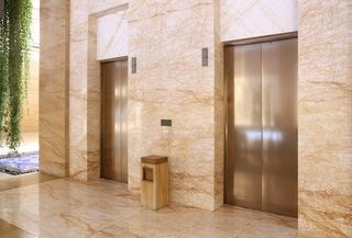 Commercial Elevator with a repairman – North Queensland lift installation in Townsville,QLD