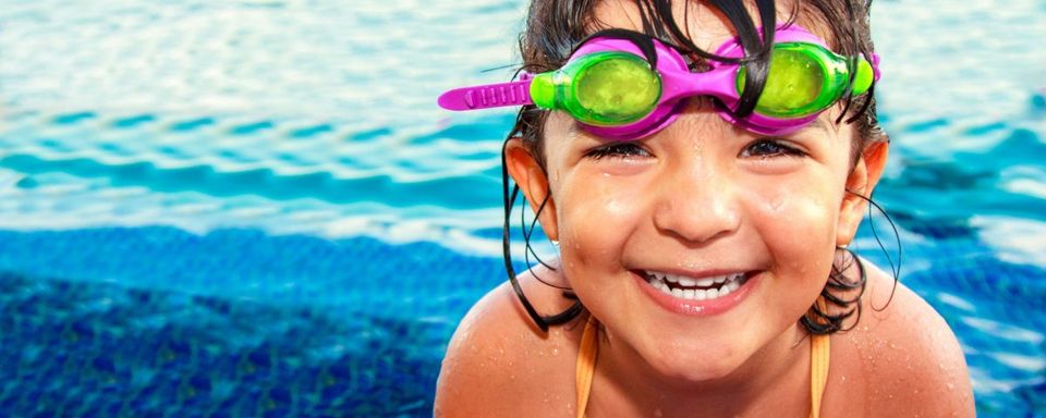 Eye Health — Kid Smiling in Pool in Lafayette, IN