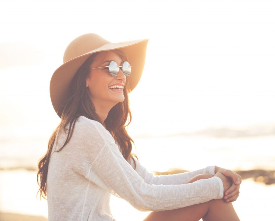 Progressive Lens — Woman Wearing Sunglasses on Beach in Lafayette, IN