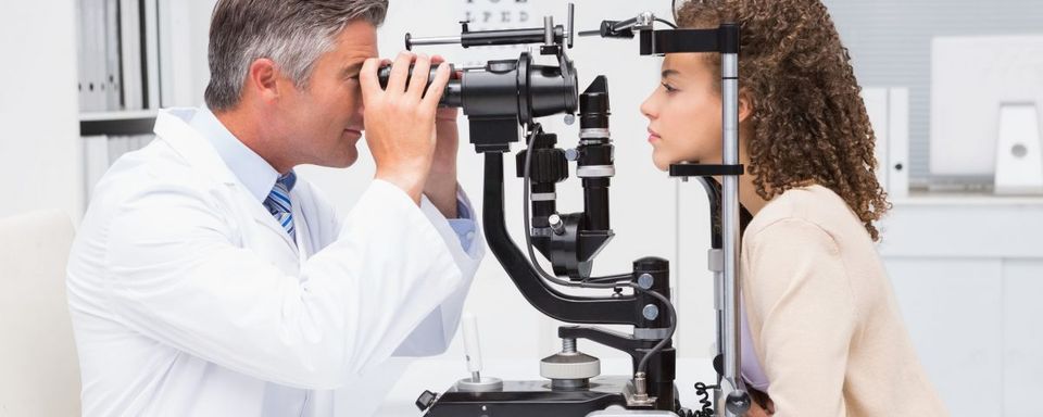 Eye Exam — Woman Having Eye Exam in Lafayette, IN